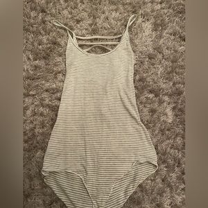 White and grey striped bodysuit. Never worn.